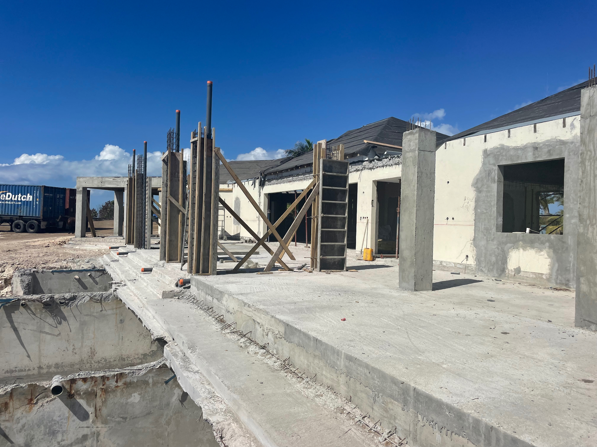 Before · Villa Under Construction